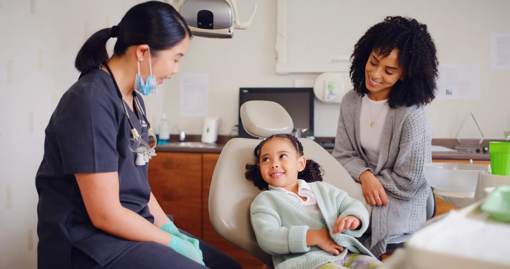 A young child smiling during an orthodontic checkup