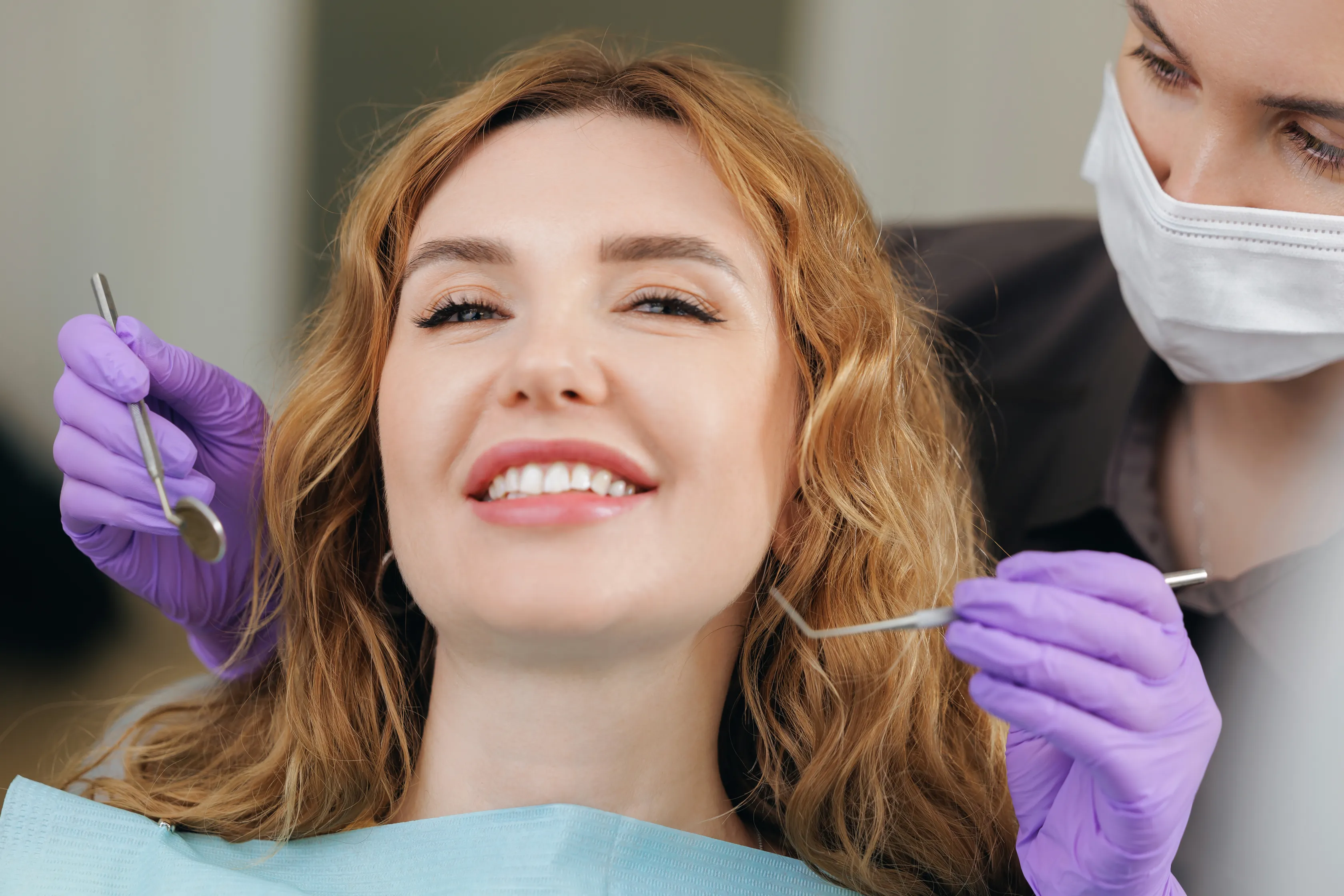 A hygienist providing periodontal maintenance care